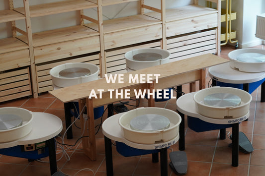 WE MEET AT THE WHEEL
